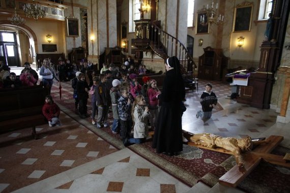 Reuters / Photo by Scanpix / in the Church of Poland