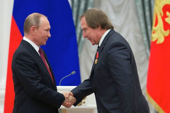 AFP / Photo by Scanpix / Vladimir Putin and Sergei Roldugin