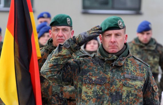 AFP/„Scanpix“ nuotr./Vokiečių kariai ir karinė technika