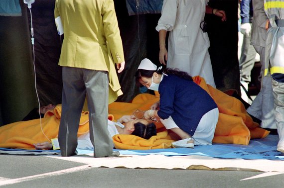 AFP / Scanpix Photo / Medics provide first aid to victims after attacks