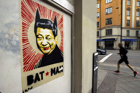 Scanpix / AP Photo / Poster in Stockholm with a cartoon of Xi Jinping called Batman