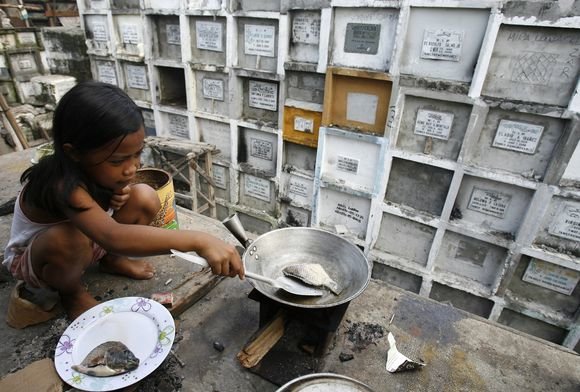„Reuters“/„Scanpix“ nuotr./Atotrūkis tarp turtingųjų ir skurdžių daugelyje pasiturinčių valstybių didėja.