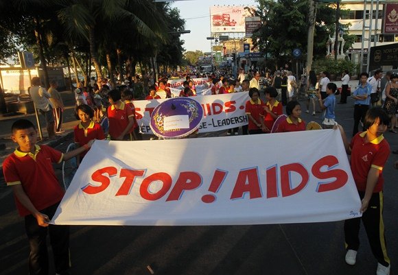 „Reuters“/„Scanpix“ nuotr./Pasaulinės kovos su AIDS dienos minėjimas