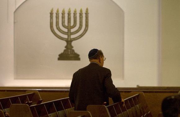 „Reuters“/„Scanpix“ nuotr./Žydų bendruomenės narys