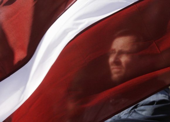 „Reuters“/„Scanpix“ nuotr./Latvijos vėliava