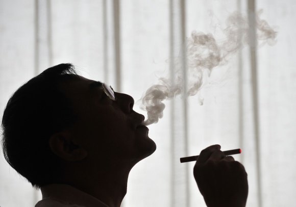 AFP/„Scanpix“ nuotr./Elektroninė cigaretė
