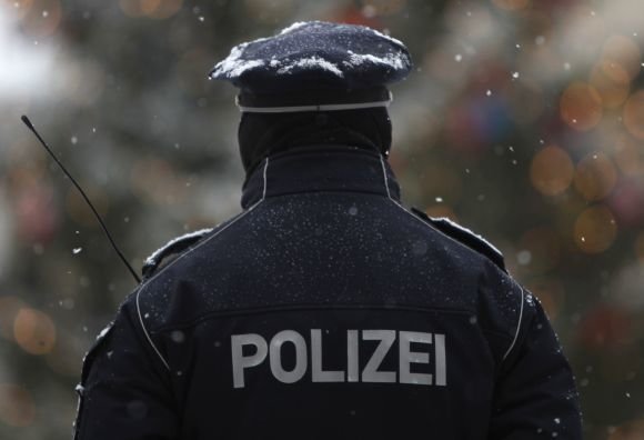 „Reuters“/„Scanpix“ nuotr./Vokietijos policininkas