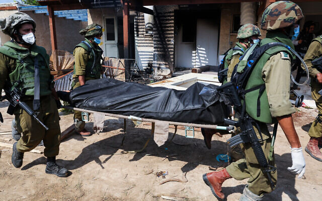 AFP/„Scanpix“ nuotr./Kariai kibuce rado du šimtus kūnų