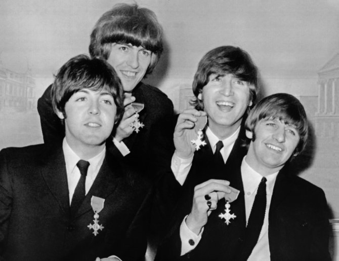 AFP/„Scanpix“ nuotr./„The Beatles“ 1965-aisiais (iš kairės): Paulas McCartney, George'as Harrisonas, Johnas Lennonas ir Ringo Starras
