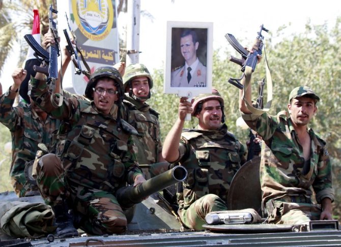 AFP/Scanpix nuotr./Sirijos kariai 