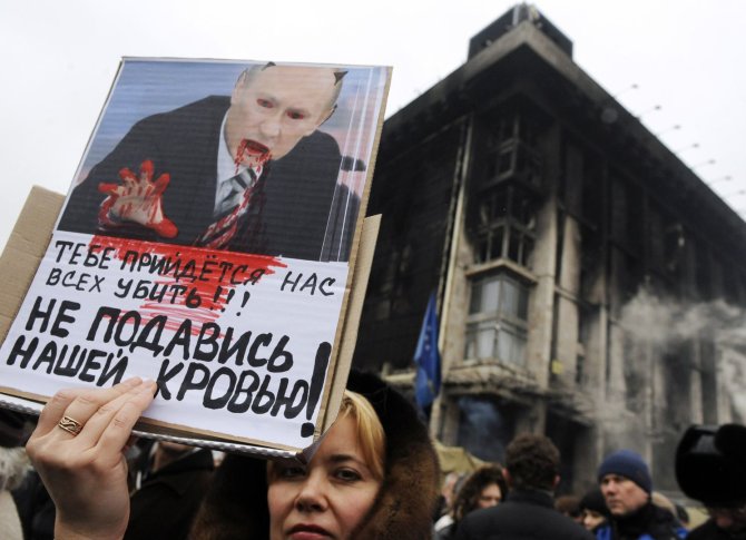 AFP/„Scanpix“ nuotr./Protesto akcija prieš Vladimiro Putino sukeltą karą Ukrainoje 