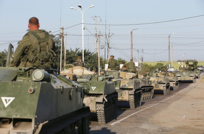 „Reuters“/„Scanpix“ nuotr./Rusijos kariai šalia Ukrainos sienos