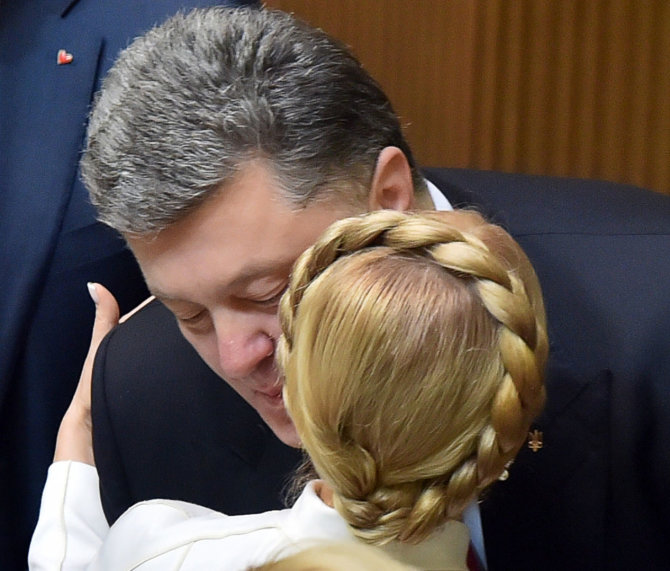 AFP/„Scanpix“ nuotr./Petro Porošenka ir Julija Tymošenko