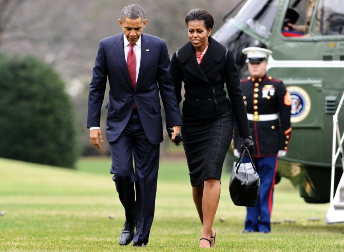 AFP/„Scanpix“ nuotr./Michelle Obama ir Barackas Obama