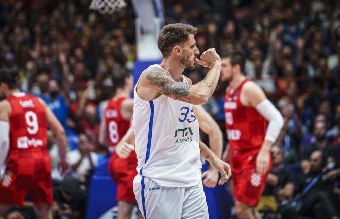 FIBA nuotr./Achille Polonara ir kiti Italijos krepšininkai užsitikrino bilietą į atkrintamąsias kovas.