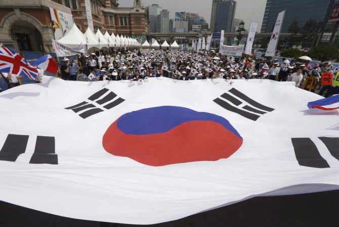 „Reuters“/„Scanpix“ nuotr./Pietų Korėjos vėliava
