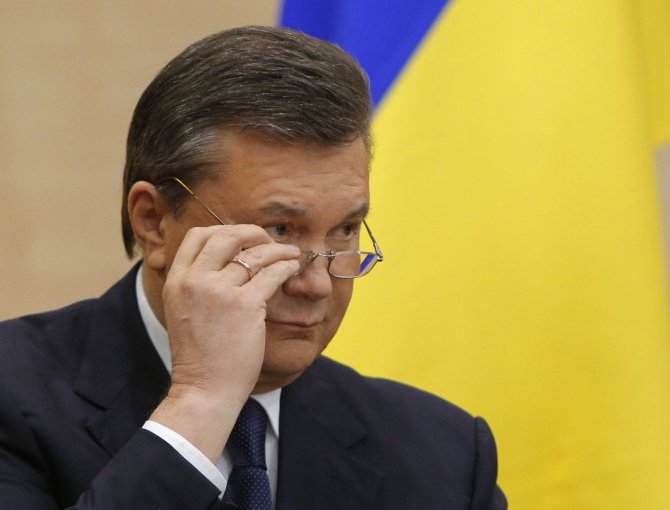 „Reuters“/„Scanpix“ nuotr./Viktoras Janukovyčius spaudos konferencijoje