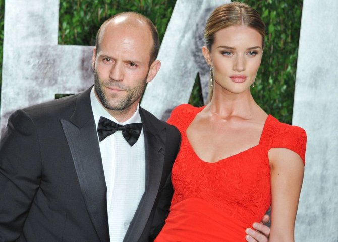 „Scanpix“ nuotr./Jasonas Stathamas ir Rosie Huntington-Whiteley