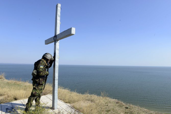 AFP/„Scanpix“ nuotr./Ukrainos karys Mariupolyje