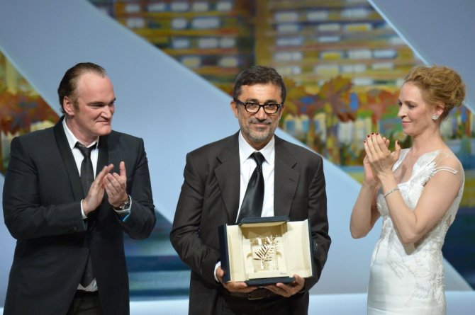 AFP/„Scanpix“ nuotr./Turkų režisierius Nuri Bilge Ceylanas su Quentinu Tarantino ir Uma Thurman