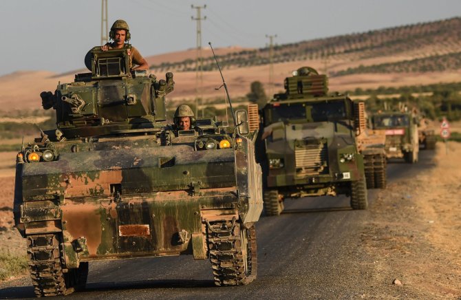 AFP/„Scanpix“ nuotr./Turkijos kariai Sirijos teritorijoje