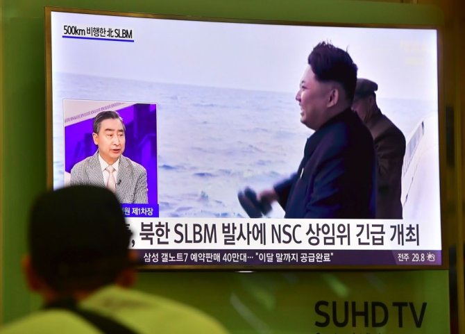 AFP/„Scanpix“ nuotr./Šiaurės Korėja paleido raketą