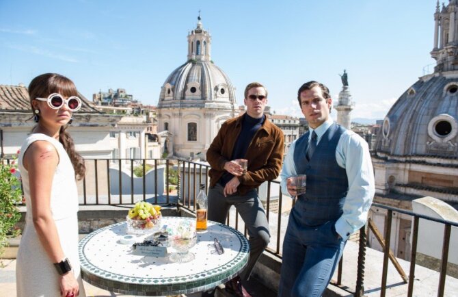 „ACME Film“ nuotr./Alicia Vikander, Armie Hammeris ir Henry Cavillas filme „Šnipas iš U.N.C.L.E.“