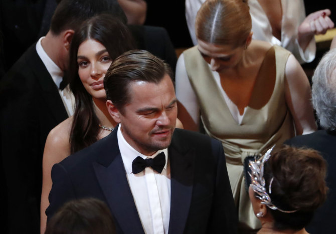 „Reuters“/„Scanpix“ nuotr./Leonardo DiCaprio ir Camila Morrone „Oskaruose“