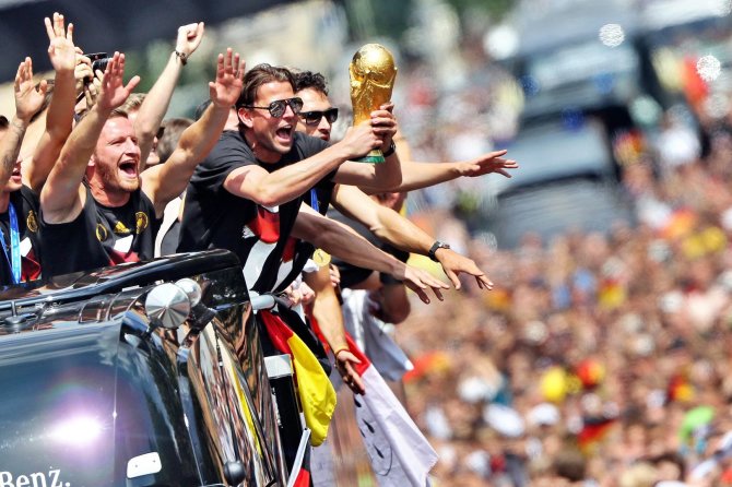 AFP/„Scanpix“ nuotr./Vokietijos futbolo rinktinės sutiktuvės Berlyne