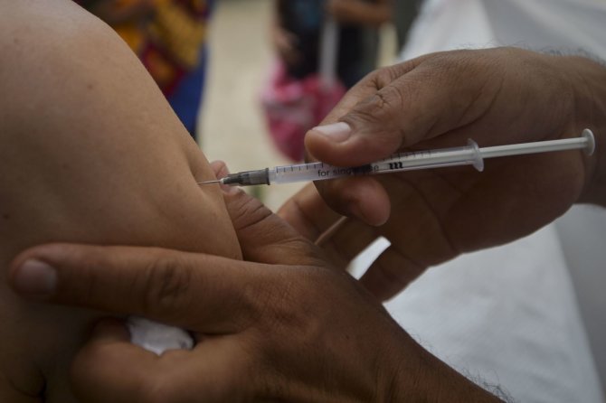 AFP/„Scanpix“ nuotr./Vakcina