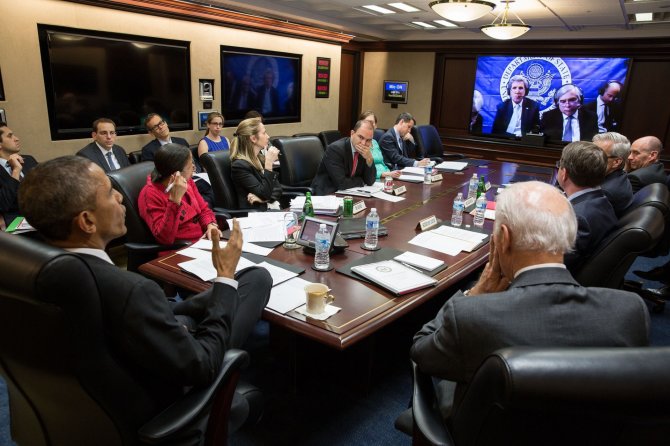 AFP/„Scanpix“ nuotr./Barackas Obama konferencijoje su Johny Kerry