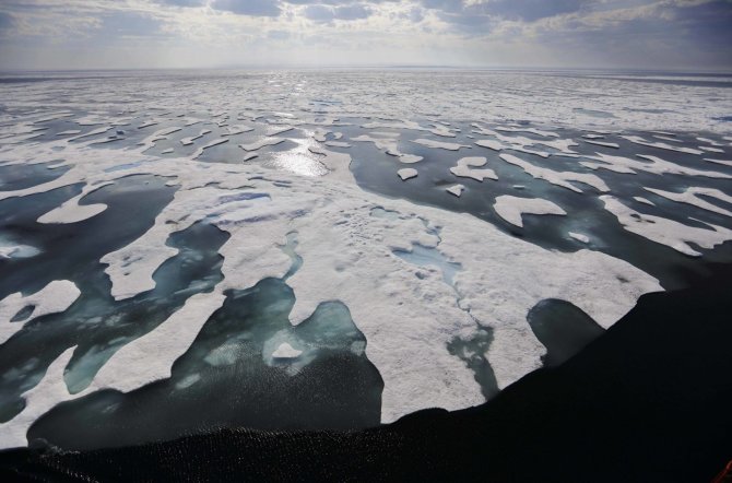 „Scanpix“/AP nuotr./Arkties tirpstančio ledo peizažai