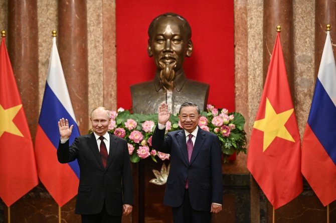 „Reuters“/„Scanpix“ nuotr./Vladimiras Putinas ir To Lamas