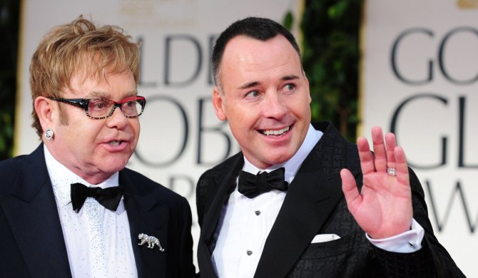 AFP/„Scanpix“ nuotr./Eltonas Johnas ir Davidas Furnishas