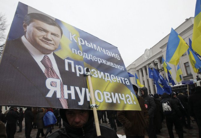 „Reuters“/„Scanpix“ nuotr./V.Janukovyčiaus šalininkai Kryme
