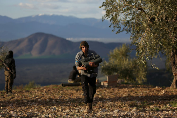 „Reuters“/„Scanpix“ nuotr./Laisvosios Sirijos armijos karys Afrine