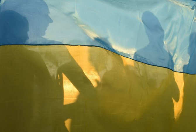 AFP/„Scanpix“ nuotr./Ukrainos vėliava