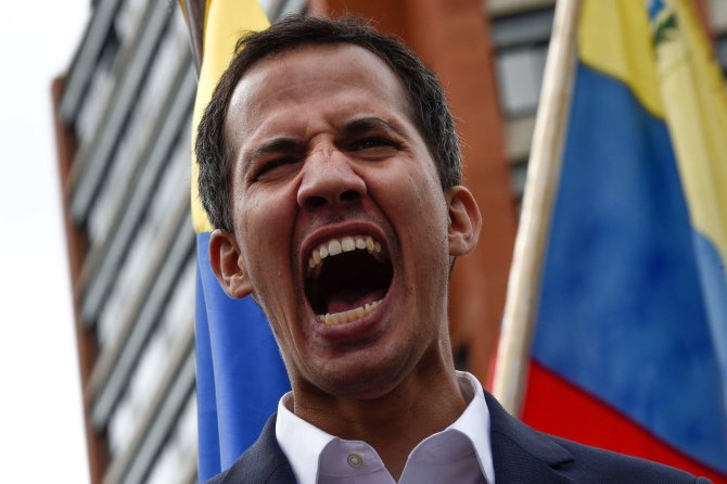 AFP/„Scanpix“ nuotr./Venesuelos prezidentu pasiskelbęs Juanas Guaido