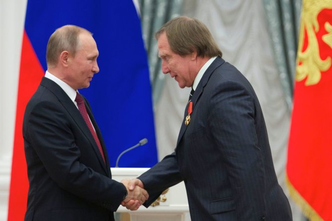 AFP/„Scanpix“ nuotr./Vladimiras Putinas ir Sergejus Rolduginas