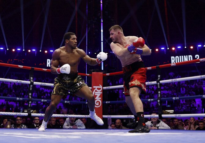 „Reuters“/„Scanpix“ nuotr./Anthony Joshua prieš Kristianą Prengą