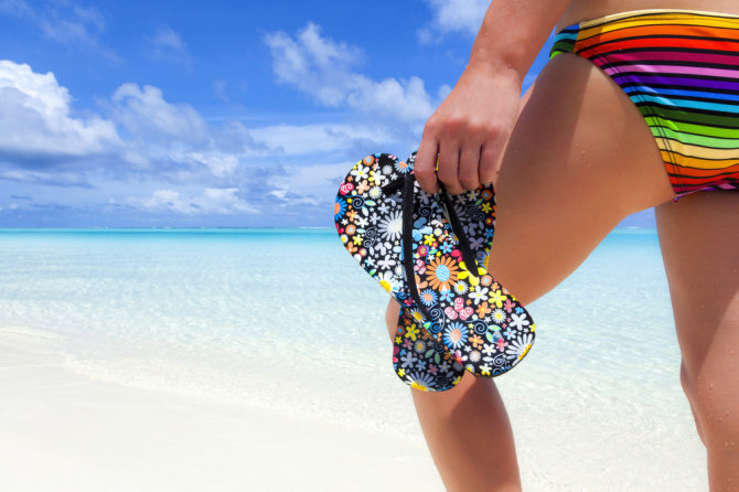 Shutterstock nuotr./Mergina paplūdimyje