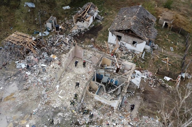 „Reuters“/„Scanpix“ nuotr./Rusų ataka Charkivo srityje, Hrozoje