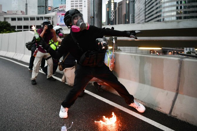 AFP/„Scanpix“ nuotr./Protestas Honkonge