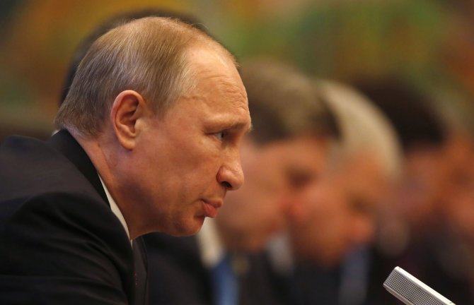 „Reuters“/„Scanpix“ nuotr./Rusijos prezidentas Vladimiras Putinas Kinijoje