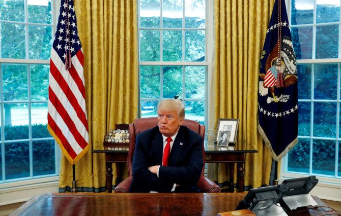 „Reuters“/„Scanpix“ nuotr./Donaldas Trumpas savo kabinete