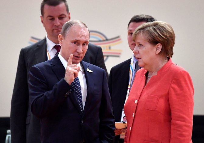 „Reuters“/„Scanpix“ nuotr./Vladimiras Putinas ir Angela Merkel