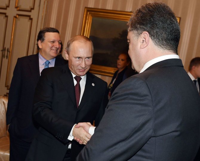 AFP/„Scanpix“ nuotr./Petro Porošenkos ir Vladimiro Putino susitikimas
