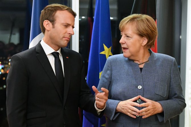 AFP/„Scanpix“ nuotr./Emmanuelis Macronas ir Angela Merkel