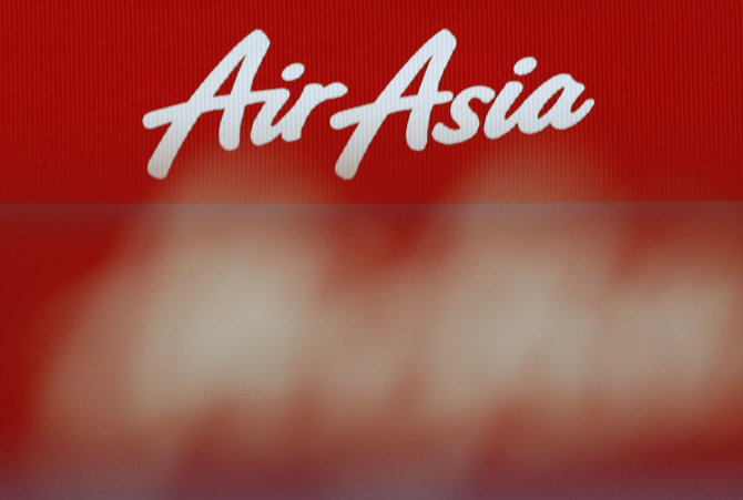 „Reuters“/„Scanpix“ nuotr./„AirAsia“ logotipas