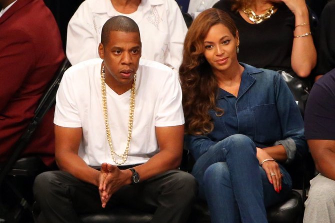 „Scanpix“/„USA Today Sports“ nuotr./Jay Z ir Beyonce stebėjo NBA rungtynes